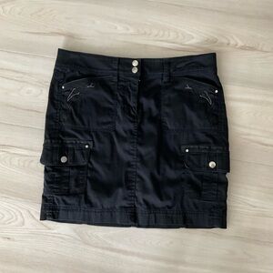 Vintage black mini skirt with pockets and design